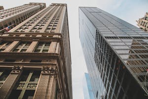 Impressive skyscrapers reaching into the sky in downtown Manhattan, showcasing architectural diversity.